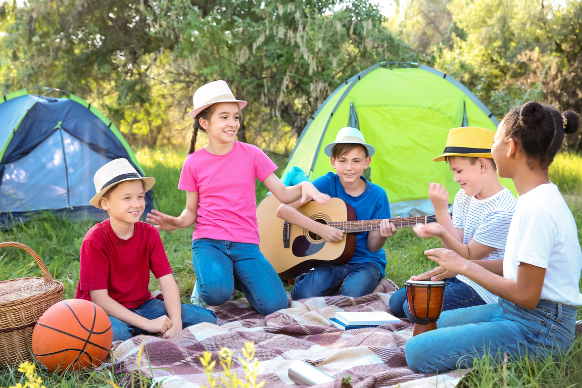 Group of Children Resting at Summer Camp